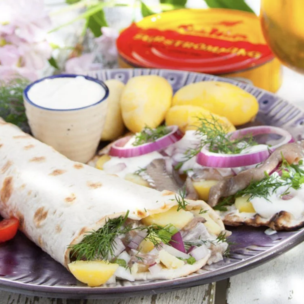 Swedish surstromming fermented herring served from Röda Ulven